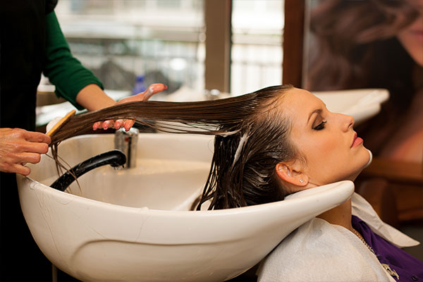 Hair Dresser Washing Hair