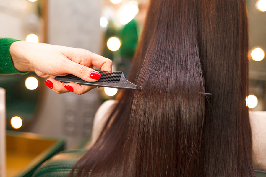 Woman Getting Hair Treatment